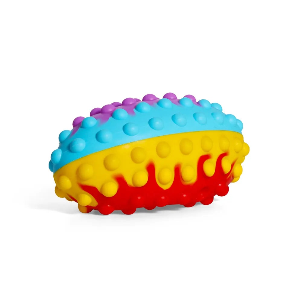 Balle de rugby Pop It multicolore vue de côté