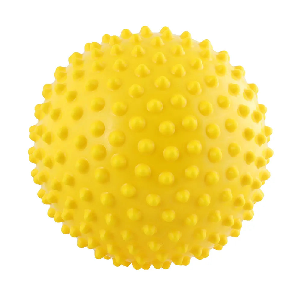 Grande balle sensorielle jaune de 15 cm à picots ronds.