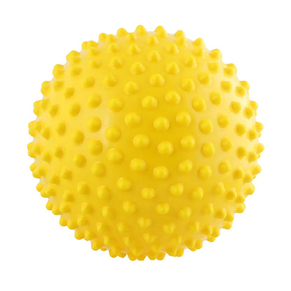 Grande balle sensorielle jaune de 15 cm à picots ronds.