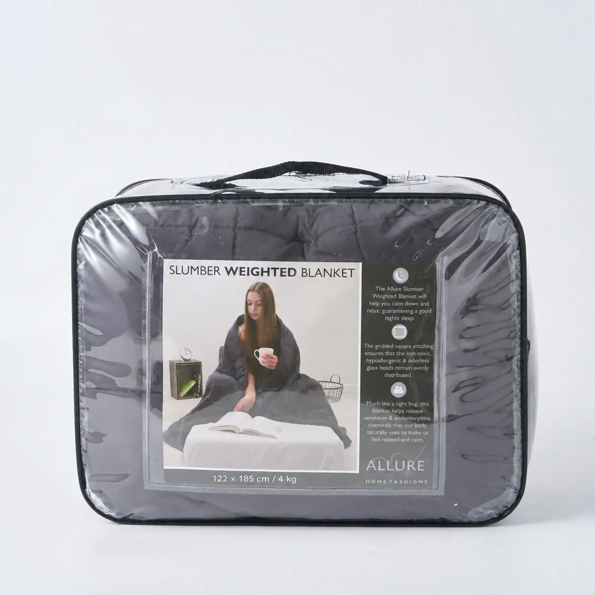Couverture lestée Slumber gris anthracite de 4 kg, 122 × 185 cm, dans son sac de transport.