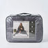 Couverture lestée Slumber gris anthracite de 4 kg, 122 × 185 cm, dans son sac de transport.