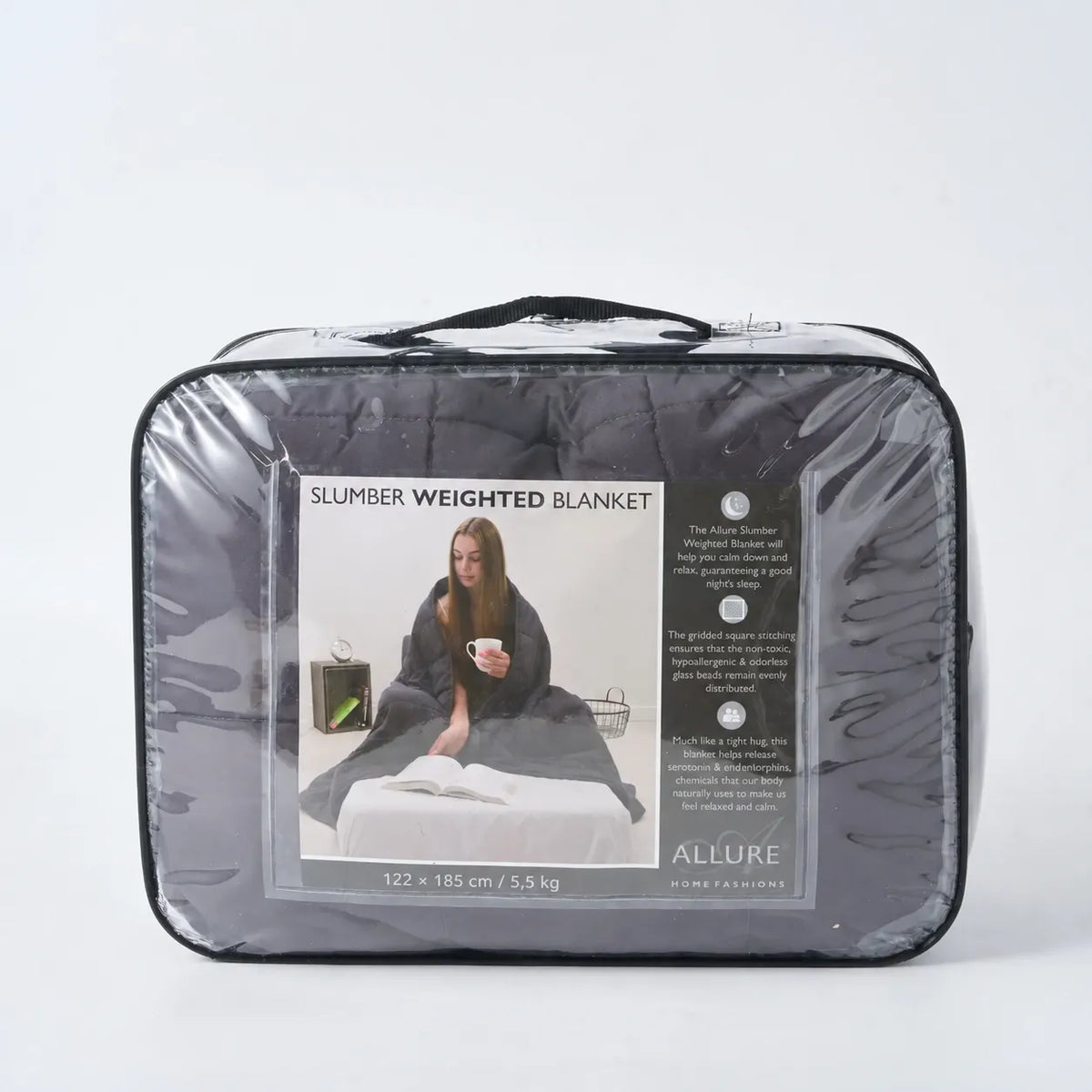 Couverture lestée Slumber gris anthracite de 5,5 kg, 122 × 185 cm, dans son sac de transport.