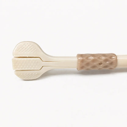 Brosse à dents à trois têtes vue de dos