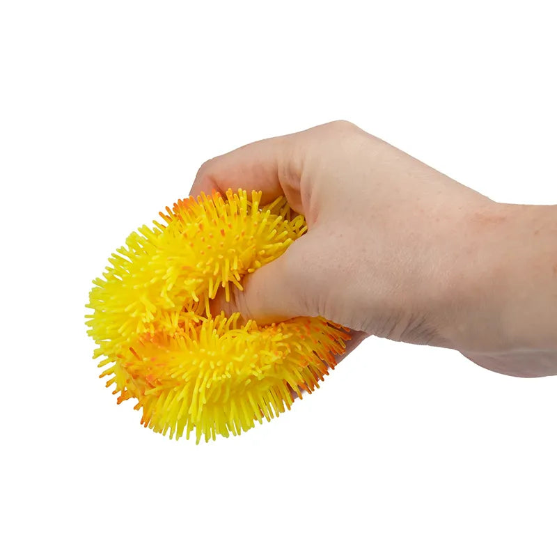 Balle pompon déformable bicolore