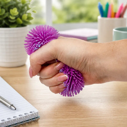 Balle pompon déformable bicolore