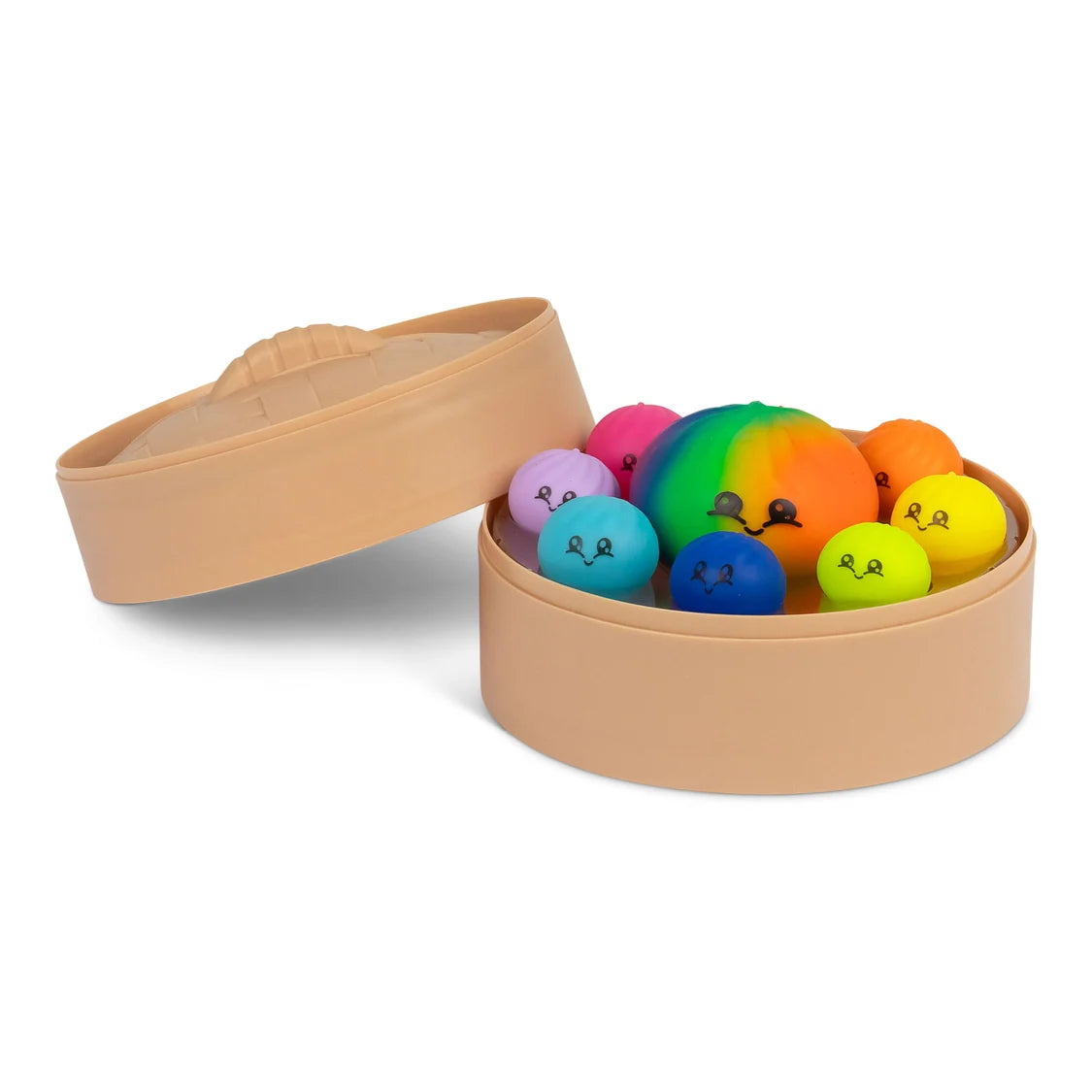 Squishies antistress colorés rangés dans leur panier vapeur, couvercle posé à côté