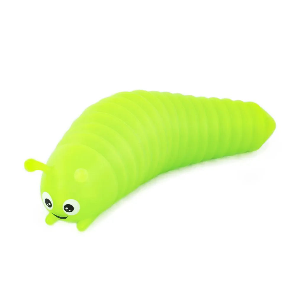Limace articulée phosphorescente vert clair, avec yeux et sourire, sur fond blanc.