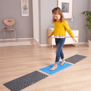 Tapis de galets sensoriel