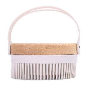 Brosse sensorielle ronde pour la douche ou le bain de la personne avec des troubles perceptifs